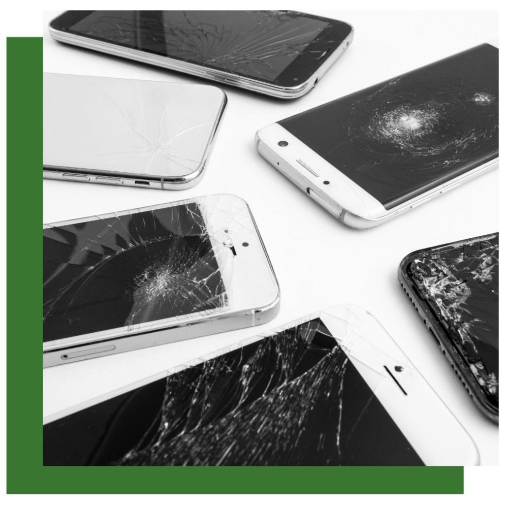 Six broken smartphones with cracked screens