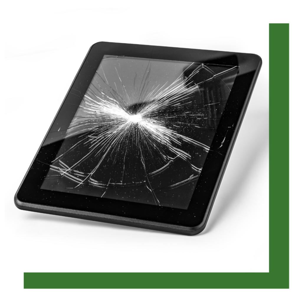 An old tablet with a smashed glass screen